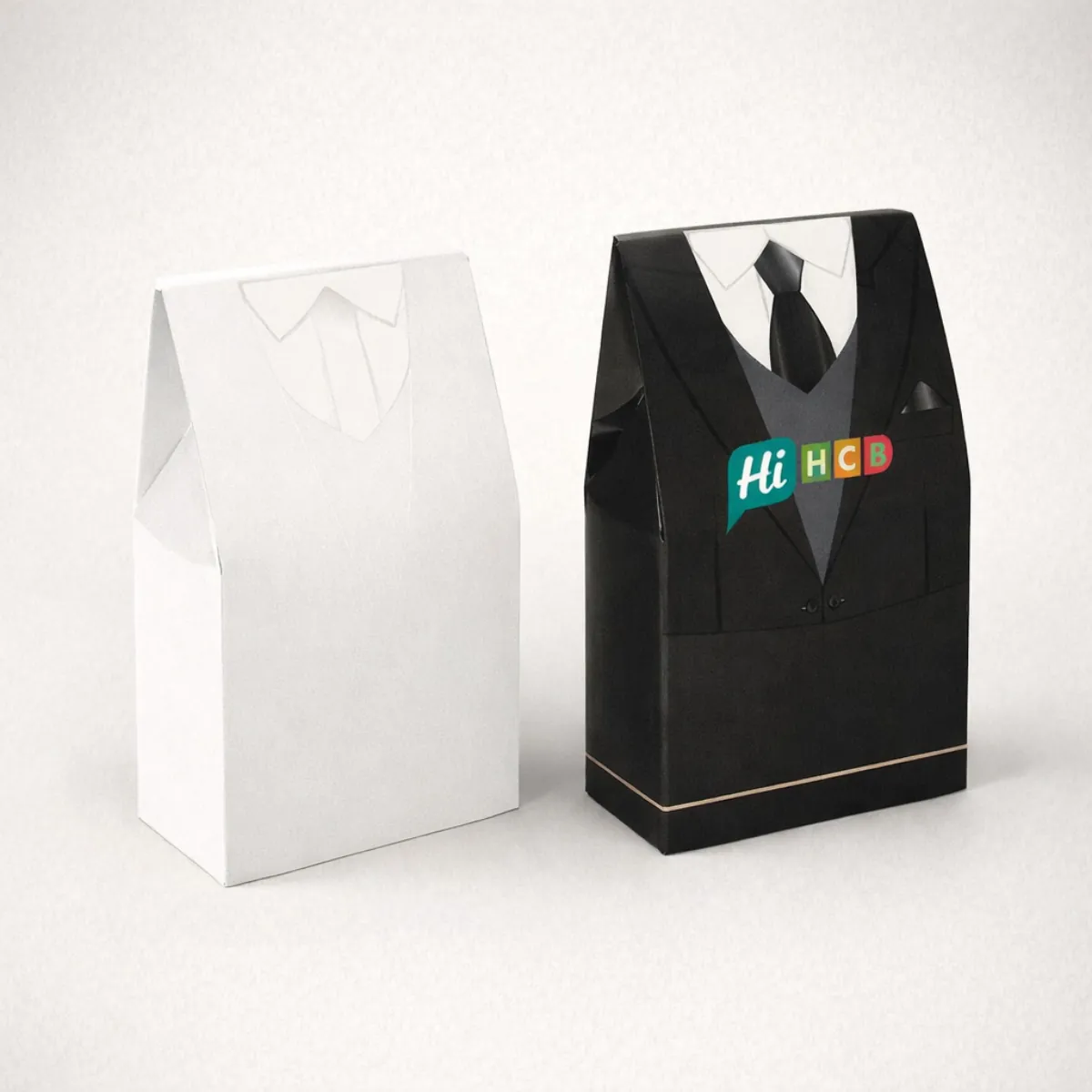Novelty gift bags designed to look like a formal black tuxedo suit with a tie- class=